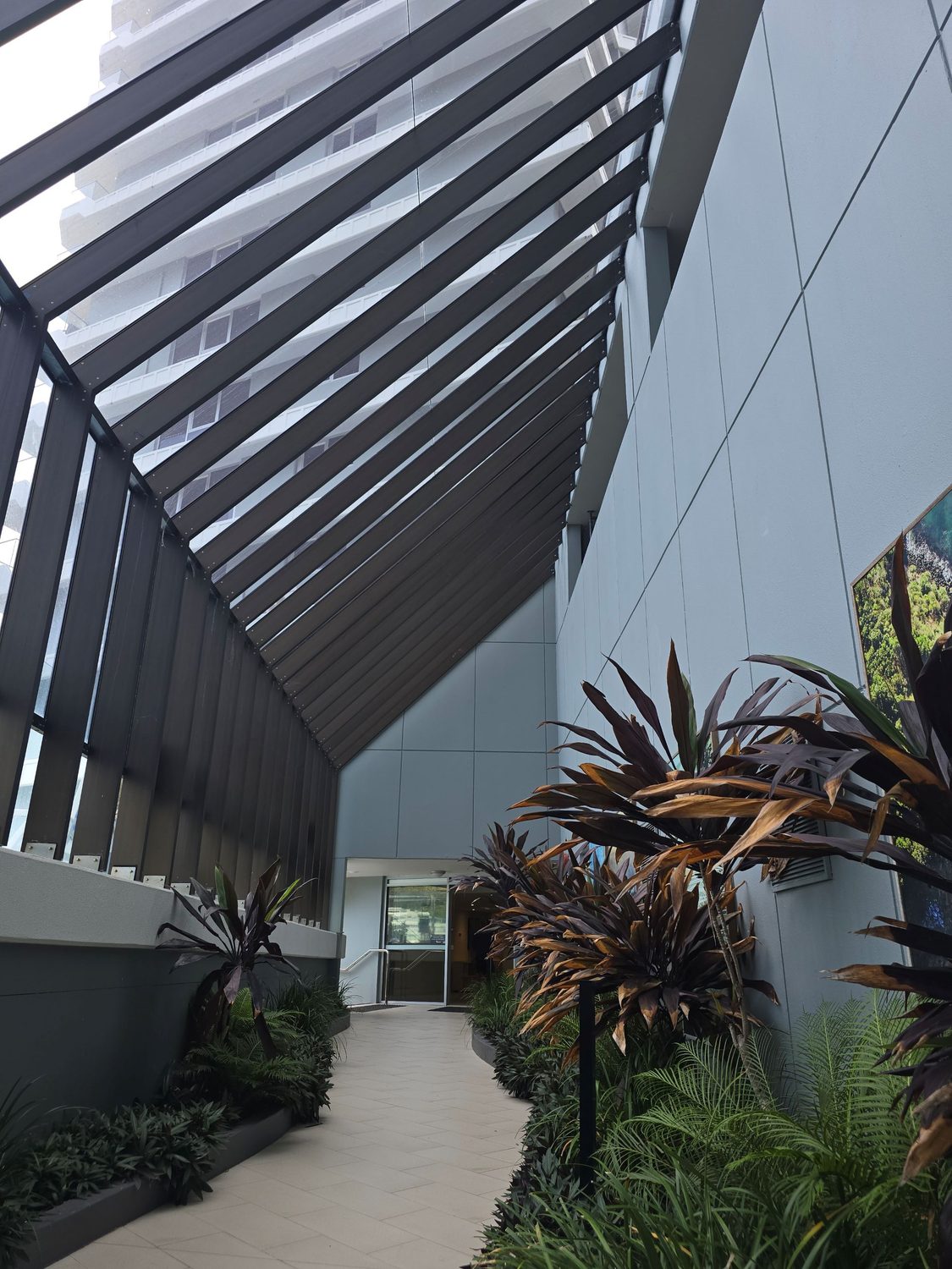 Tranquil walk through our Atrium to your holiday unit. Gemini Court Holiday Apartments, Gold Coast Holiday