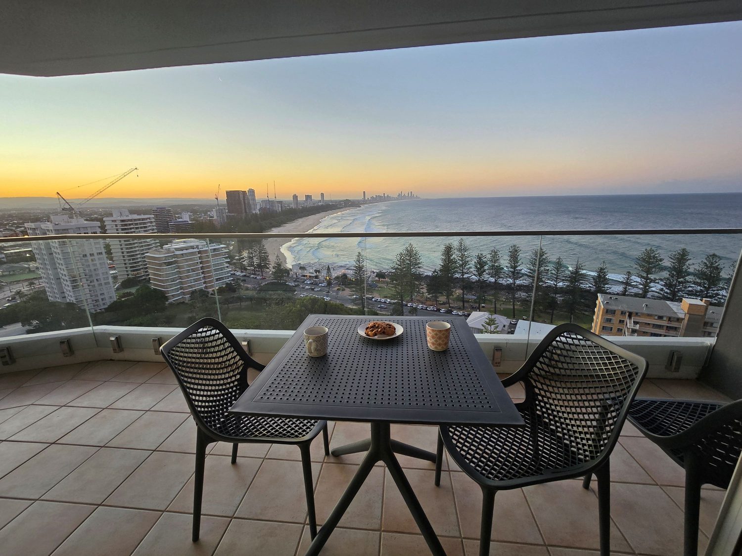 Taking in the golden sunsets of the Gold Coast with Ocean views, while sitting on your own private balcony at Gemini Court
