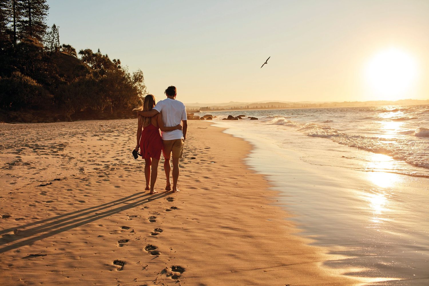 Feel the sand between toes and enjoy the walk along Kirra Beach